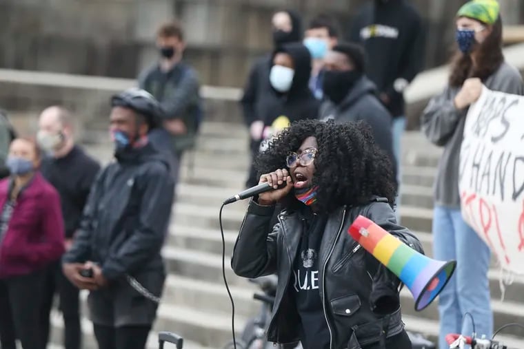 Kendall Stephens speaks during a protest against police violence and racism at the Philadelphia Museum of Art steps on Saturday.