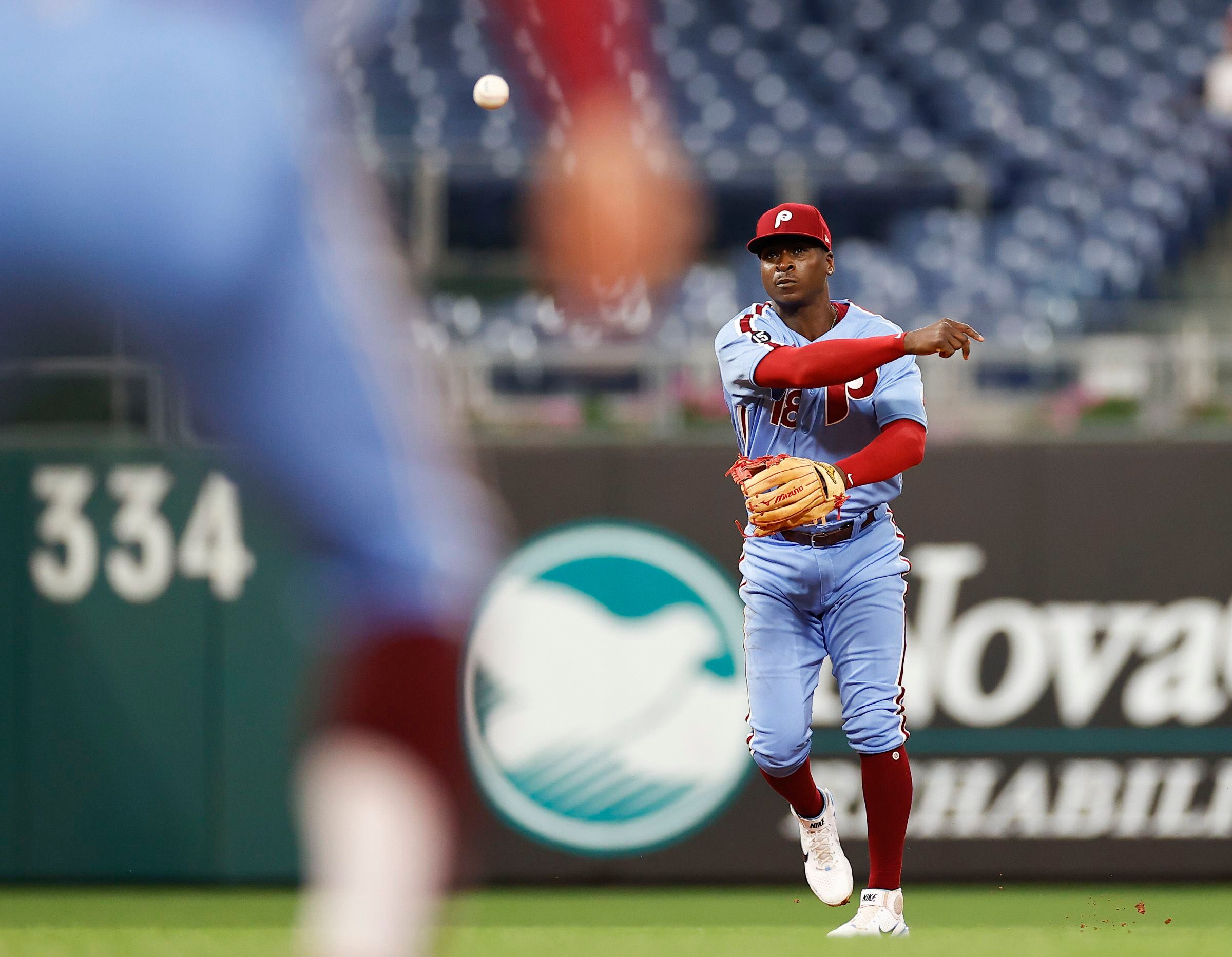 Philadelphia Phillies - Bryson Stott arriving at Globe Life Field for  Opening Day in Texas. He is wearing a light gray sweatshirt, dark colored  jeans and a black hat. He his also