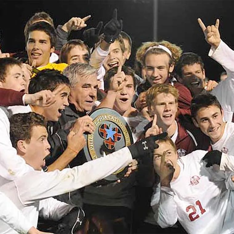 St. Joseph's Prep soccer coach Jim Murray and the Hawks celebrate their Catholic League championship in 2010.