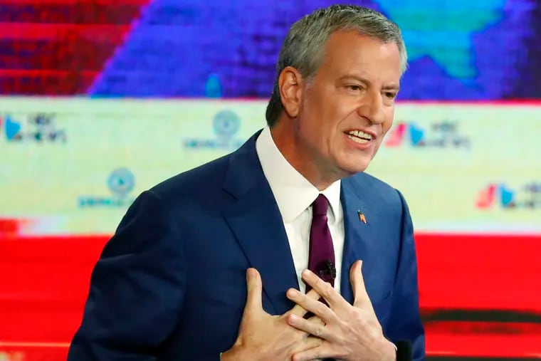 Democratic presidential candidate New York City Mayor Bill de Blasio gestures during a Democratic primary debate hosted by NBC News at the Adrienne Arsht Center for the Performing Art, Wednesday, June 26, 2019, in Miami. (AP Photo/Wilfredo Lee)
