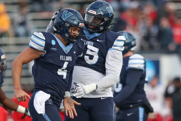 Villanova quarterback Connor Watkins (left) threw for 247 yards and two touchdowns in the Wildcats' rout of Colgate on Saturday in Hamilton, NY.