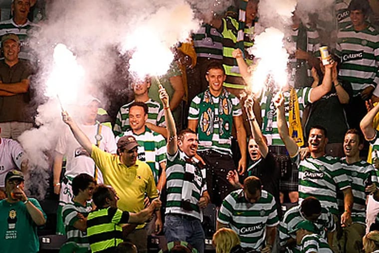 Celtic fans lit flares during Wednesday's match between Celtic F.C. and the Union. (AP Photo/Matt Slocum)