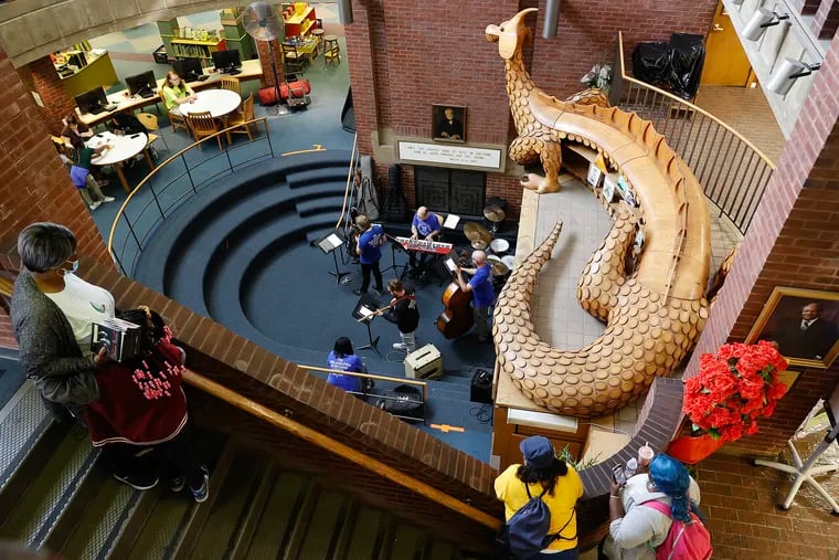 Visitors to the Joseph E. Coleman Northwest Regional Library watch the Renaissance Sextet perform on Friday, April 14, 2023. The Free Library of Philadelphia is holding free events as a part of Jazz Appreciation Month.