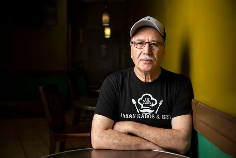 Owner Abdul Qayum posed for a portrait at his restaurant Jahan Kabob & Grill in Morrisville, Pa. Qayum came to the United States at 21 years old, but still has extended family in Afghanistan, including his sister's family in Kabul.