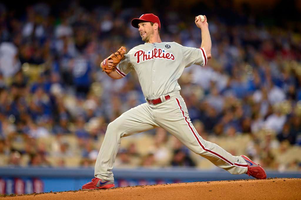 Cliff Lee, Carlos Ruiz dominant as Dodgers fall in opener to