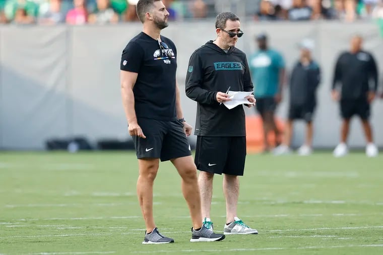 General manager Howie Roseman (right) with head coach Nick Sirianni, had some big decisions to make as the Eagles trimmed their roster to 53.