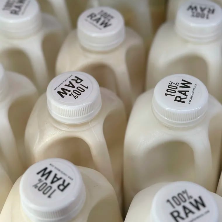 Bottles of raw milk are displayed for sale at a store in Temecula, Calif., on Wednesday, May 8, 2024. Sales of raw milk appear to be on the rise, despite an outbreak of bird flu in U.S. dairy cows. Federal officials warn about the health risks of drinking raw milk at any time, but especially during this novel outbreak. (AP Photo/JoNel Aleccia)