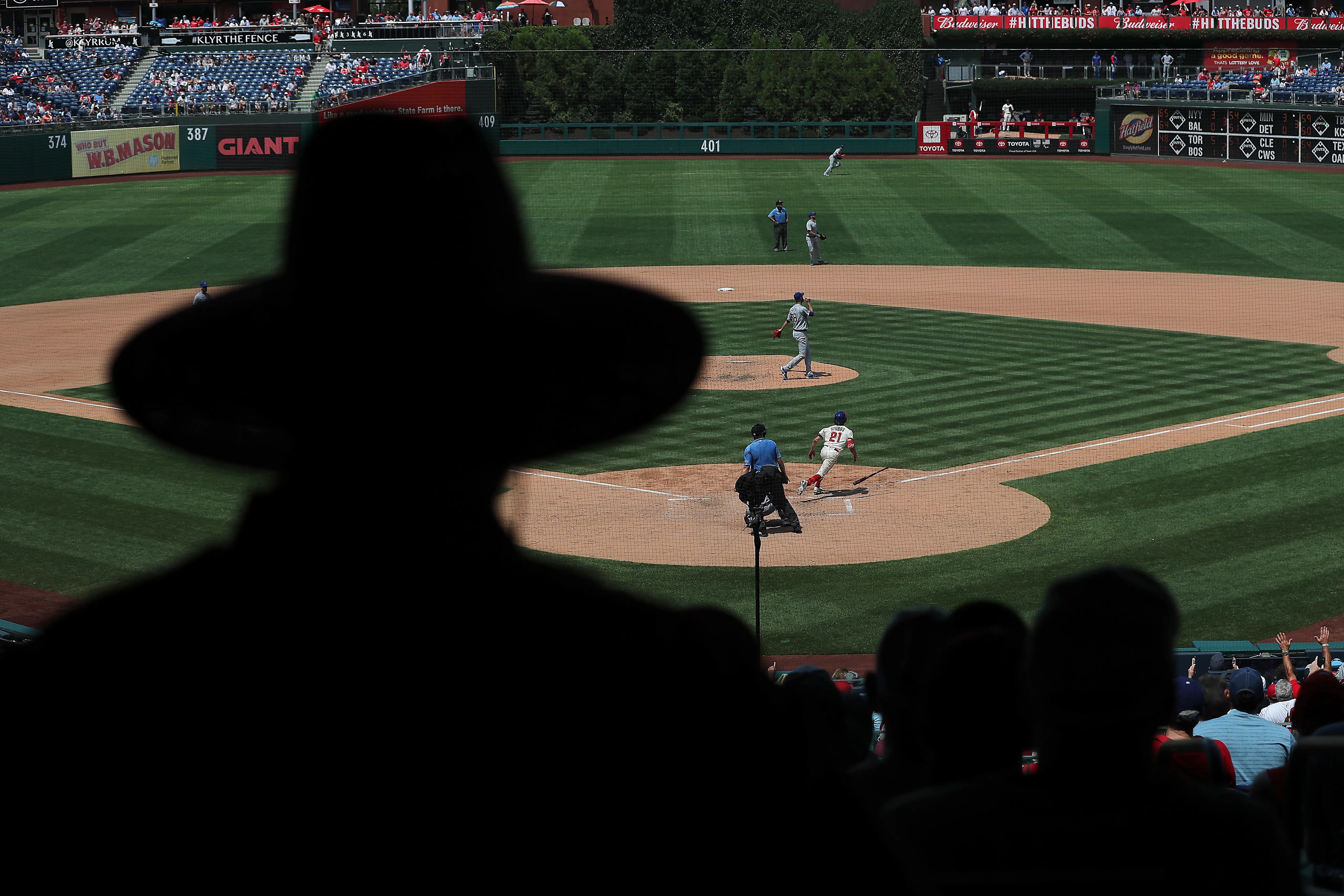 Photos from the Phillies extra innings loss to the Cubs