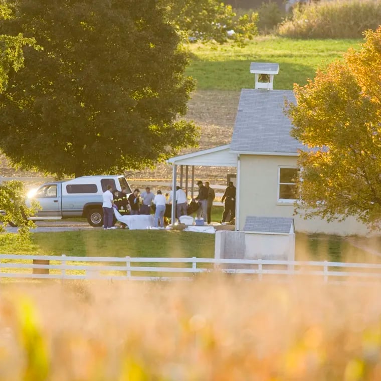 As evening falls over Lancaster County, medical personnel are at the one-room West Nickel Mines Amish School.