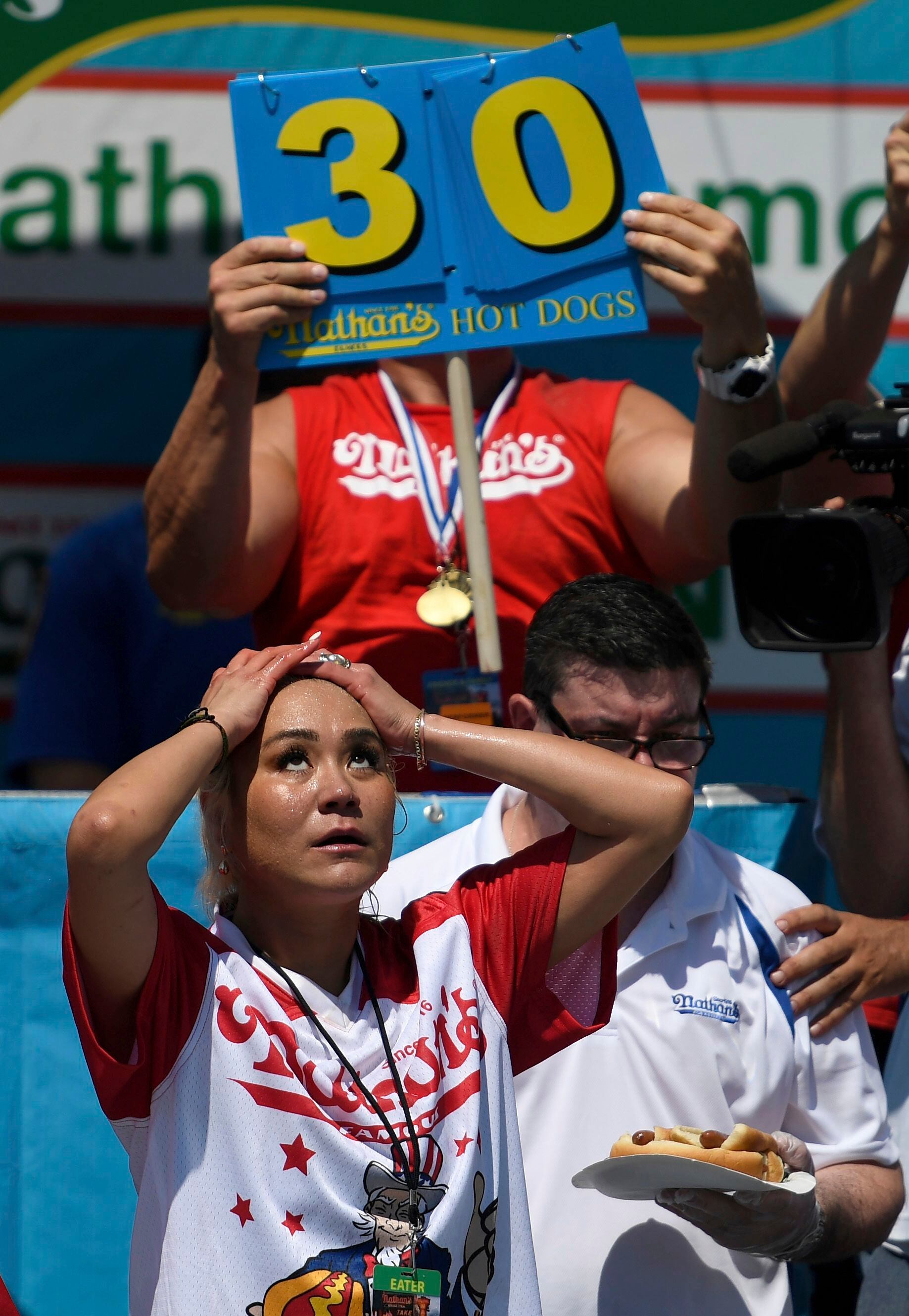 Joey Chestnut eats 71 hot dogs to win July Fourth eating contest title