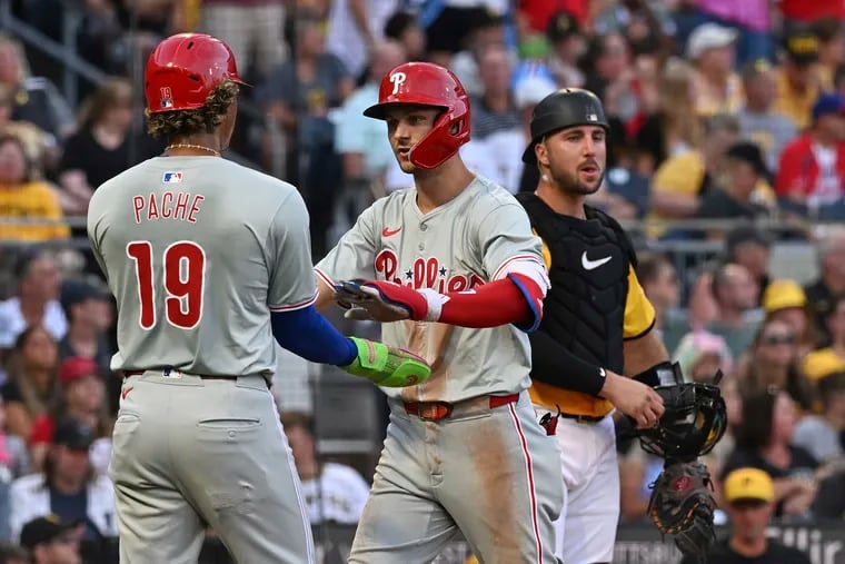 Trea Turner celebrates with Cristian Pache after hitting a two-run home run in the fourth inning.