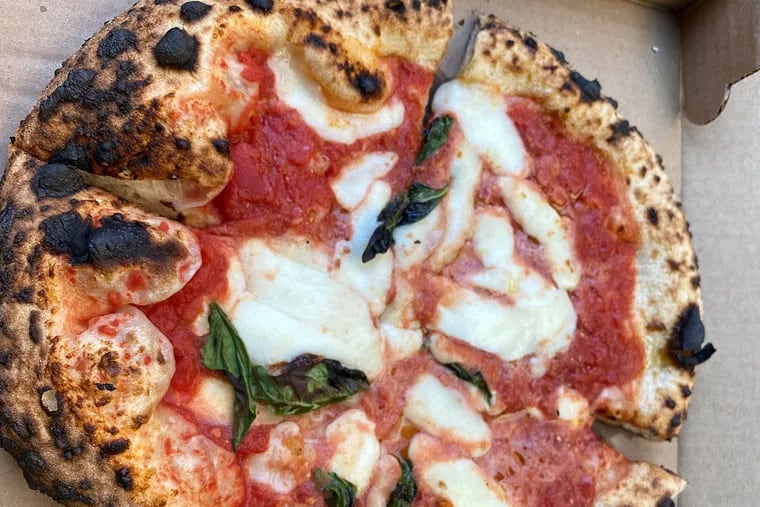 A Neapolitan pizza from Joe Cicala's wood-fired backyard oven.