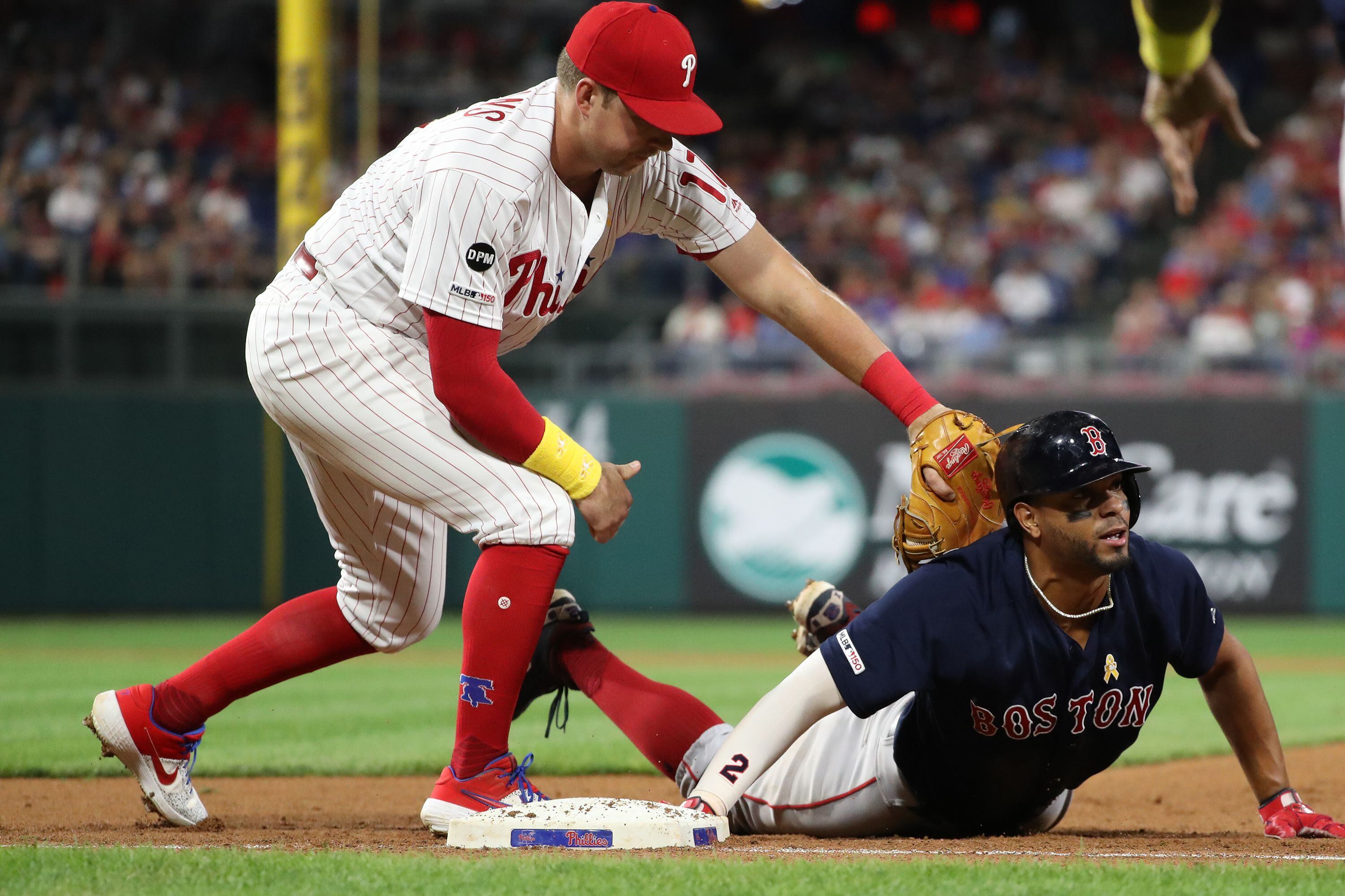 Red Sox vs Phillies delayed after fan falls into bullpen before being  carted off in a stretcher in worrying emergency