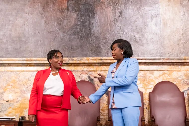 House Speaker Joanna McClinton (left) stands in the Pennsylvania House chambers with Democratic mayoral nominee Cherelle Parker during her visit to Harrisburg on Tuesday.