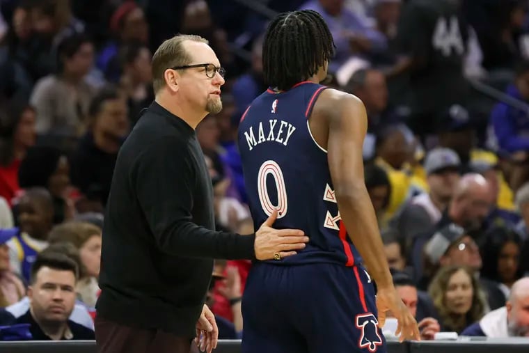 76ers coach Nick Nurse speaks to guard Tyrese Maxey against the Golden State Warriors on Wednesday. "I think they came out with another gear in the second half," Nurse said of the Warriors.