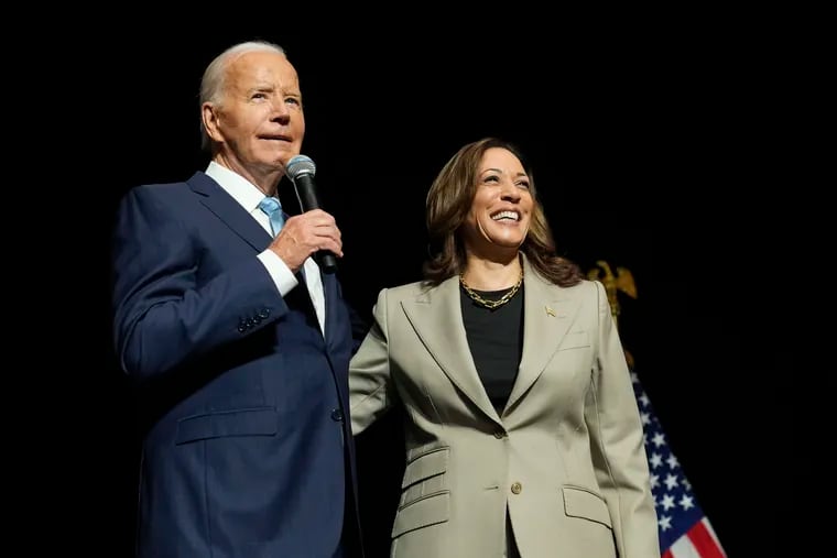 President Joe Biden, left, and Democratic presidential nominee Vice President Kamala Harris speak about the administration's efforts to lower prescription drug costs during an event at Prince George's Community College in Largo, Md. on Aug. 15.