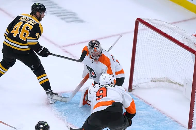 The Flyers frequently hung goalie Carter Hart out to dry against the Boston Bruins on Thursday, including on the first of center David Krejči's two third-period goals.