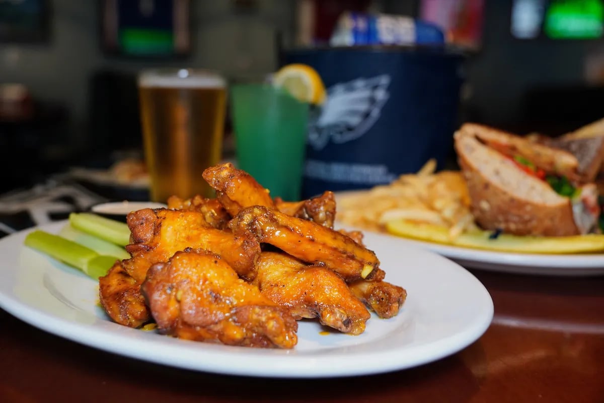 Wings and drinks are pictured at Cavanaugh's Rittenhouse in Philadelphia, Pa.