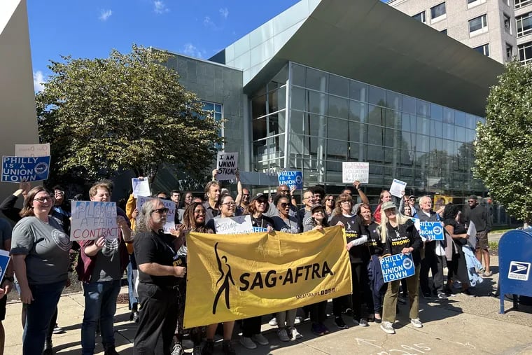 WHYY workers and supporters rally outside of the media company's offices on North Sixth Street on Oct. 9. The workers voted to approve a new contract on Monday evening.