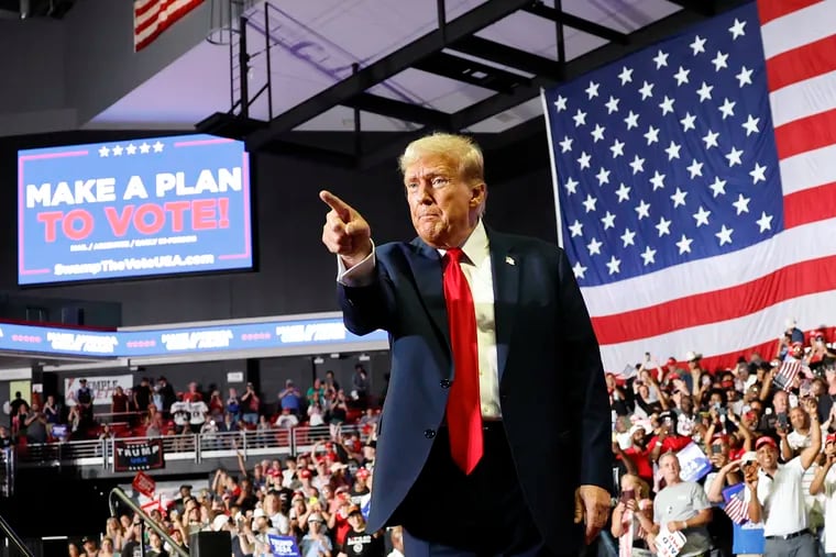 Former President Donald Trump points during a campaign rally at the Liacouras Center at Temple University in June. Trump has said he will return to Philadelphia for a debate at Independence Hall.