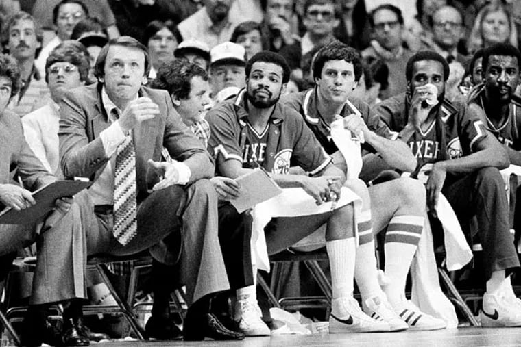 76ers head coach Bill Cunningham (left) reacts as the Boston Celtics rally in the fourth quarter in Boston, May 4, 1981. Joining Cunningham are, from left, Lionel Hollins, Bobby Jones, Ollie Johnson, and Caldwell Jones. The Celtics defeated the 76ers, 91-90, to win the Eastern Conference Championship. (AP Photo)