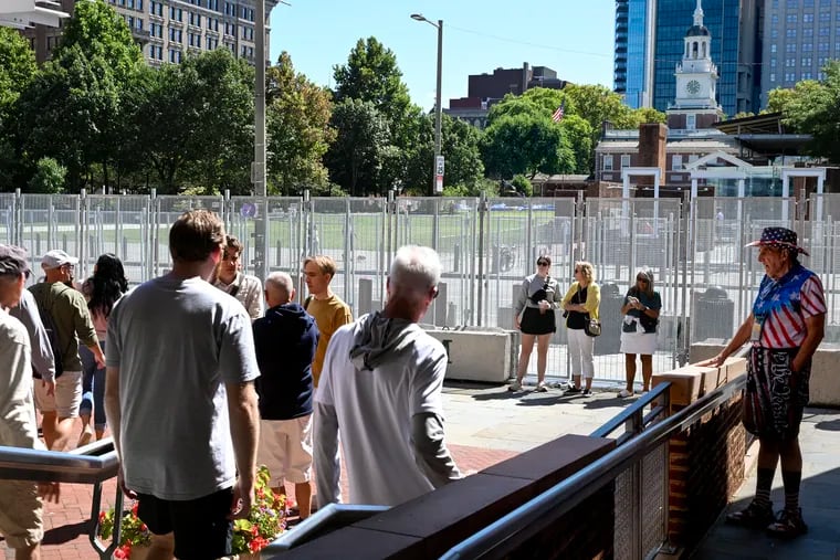 Metal fences are installed along Market Street on Independence Mall Sunday, Sept. 8, 2024, as preparations continue for Tuesday when former President Donald Trump and Vice President Kamala Harris debate at the National Constitution Center.