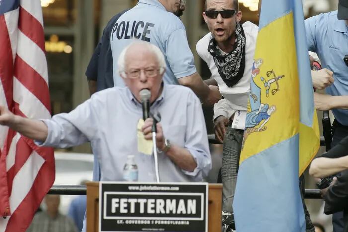 Protester Detained By Police At City Hall As Bernie Sanders Stumps For Dems In Philly 