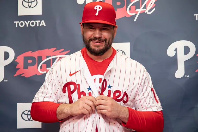 Philadelphia Phillies - Kyle Schwarber clapping his hands as he