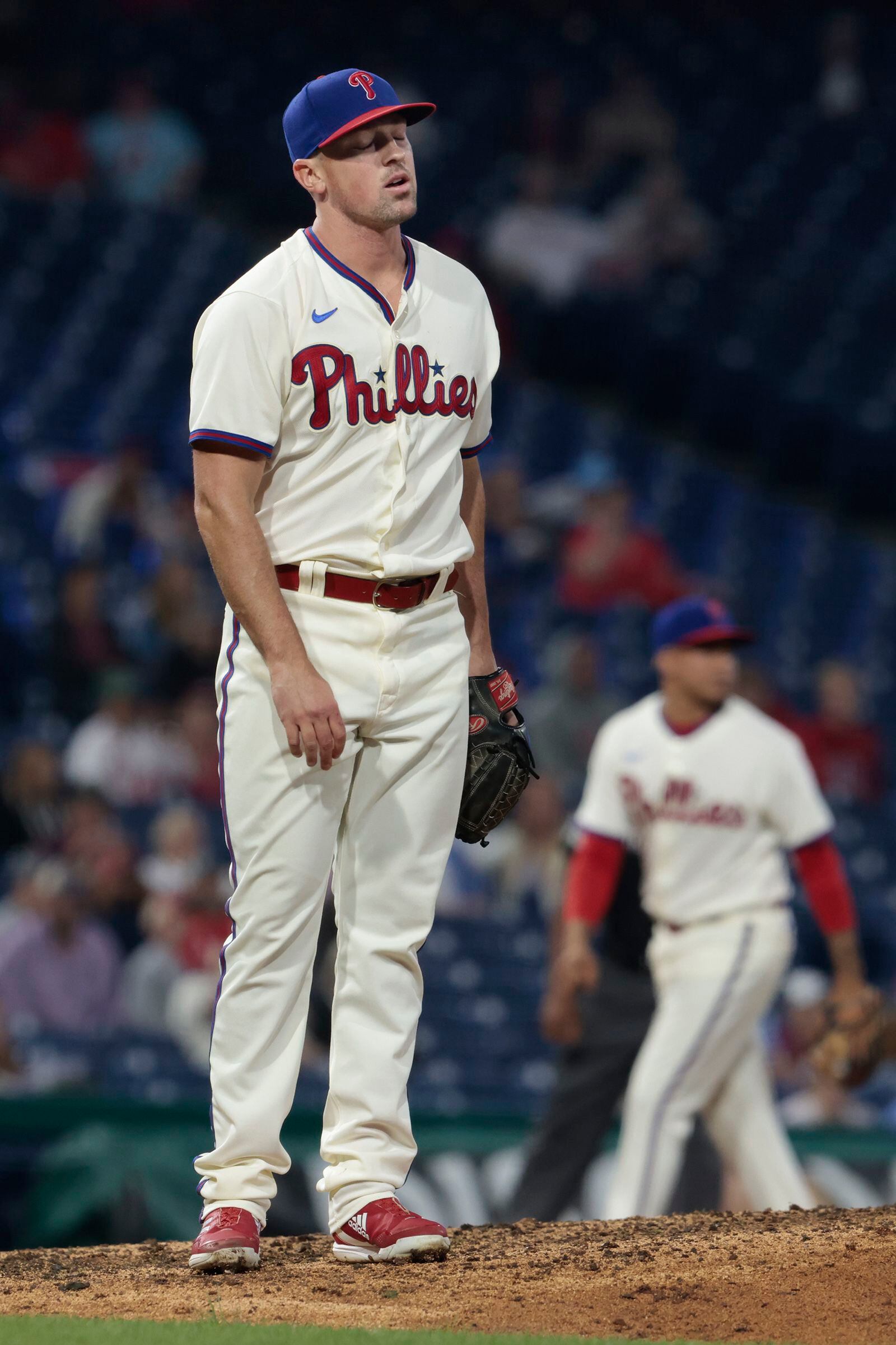 Philadelphia Phillies - Bryce Harper, Alec Bohm, J.T. Realmuto, and Rhys  Hoskins celebrating in the win line after the game. All are wearing the  cream Phillies uniform.