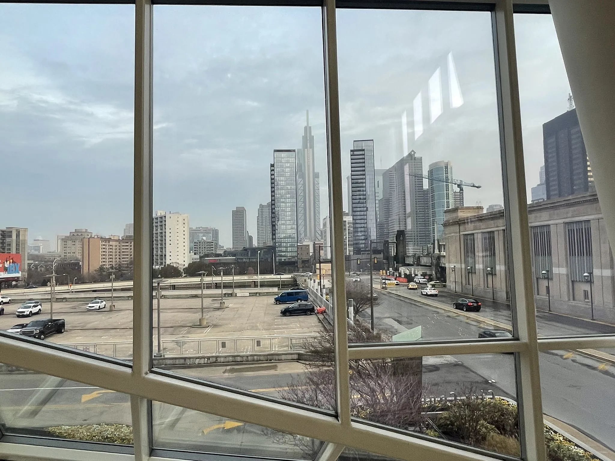 This view through the Cira tower lobby shows a two-acre deck that was built over Amtrak's Northeast corridor tracks. Located on Arch Street, just north of 30th Street Station, it has long been the favored site for a new bus station.