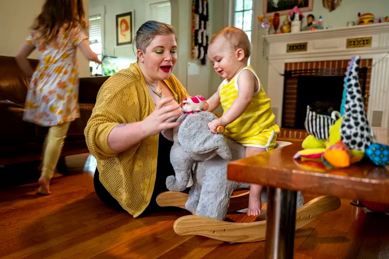 Emily and her wife have two children who are genetically related to the embryos she donated on Facebook. Here she is in South Jersey with her kids.