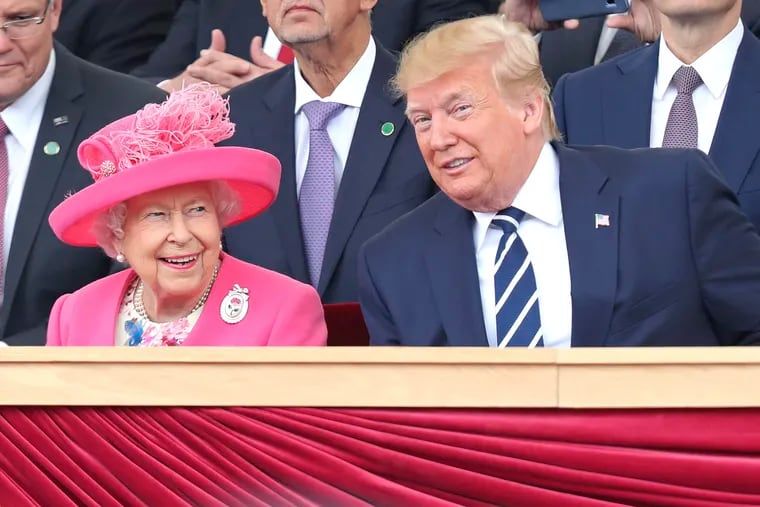 Britain's Queen Elizabeth and U.S President Donald Trump look on during commemorations for the 75th Anniversary of the D-Day landings at Southsea Common, Portsmouth, England, Wednesday, June 5, 2019. (Chris Jackson/Pool Photo via AP)