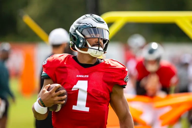 Eagles quarterback Jalen Hurts with the ball during training camp at the NovaCare Complex on Tuesday