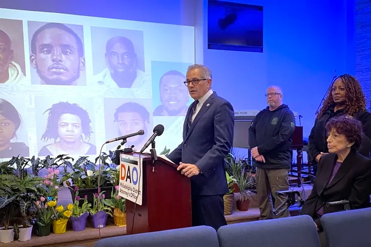 Philadelphia District Attorney Larry Krasner and Sheriff Rochelle Bilal (standing, right) ask the public in an April 2023 news conference to help them apprehend fugitives wanted on homicide charges.