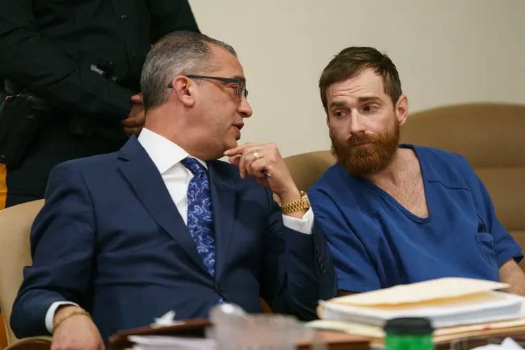 Robert "Zombie" Crosley III, right, alleged to have managed a gun-trafficking ring between Philadelphia and Camden, was ordered detained in custody after a hearing in Camden County Superior Court on Jan. 31, 2020. At left is his attorney, Robert Gamburg.
