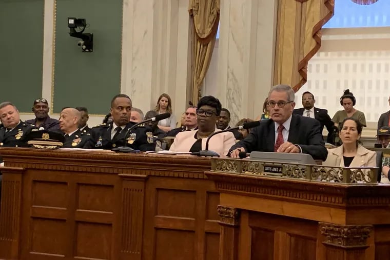 From left, Police Commissioner Richard Ross, Deputy Managing Director for Criminal Justice and Public Safety Vanessa Garrett Harley, and District Attorney Larry Krasner, at a hearing on gun violence on June 26, 2019.