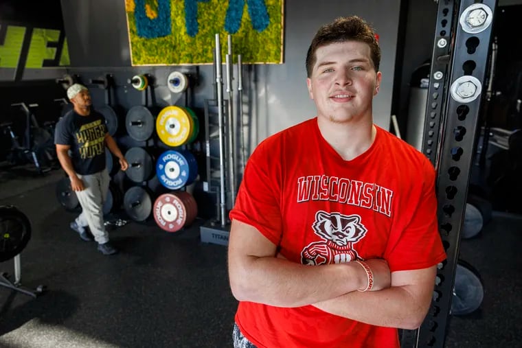 Kevin Heywood, a 6-foot-7, 305-pound offensive lineman from Pope John Paul II High, during strength training at Unfinished Athletics in Royersford.