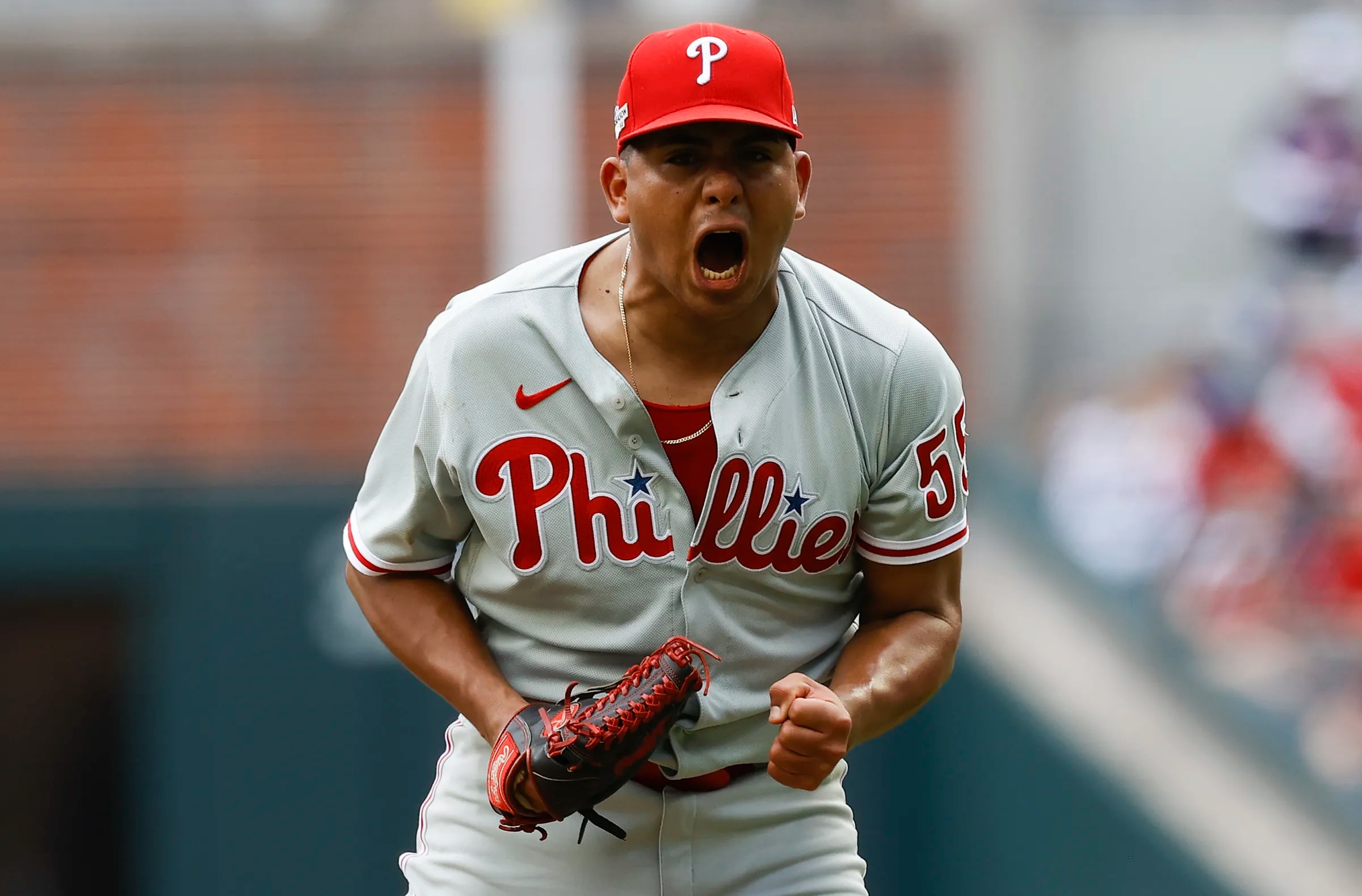 Castellanos' bat, glove help Phillies top Braves 7-6 in NLDS