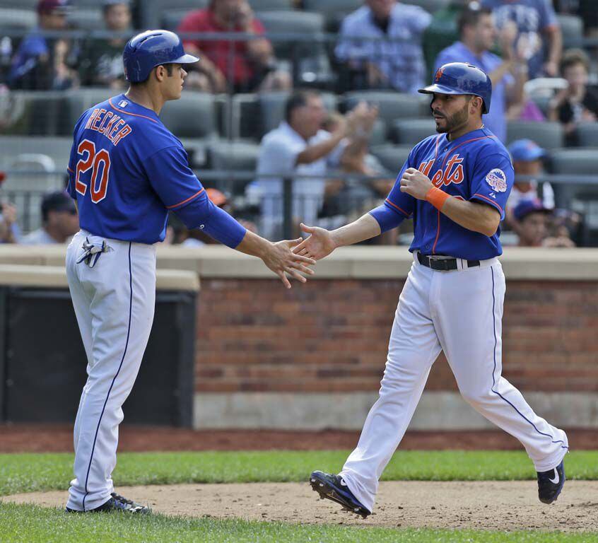 New York Mets catcher Anthony Recker (20) tags Washington