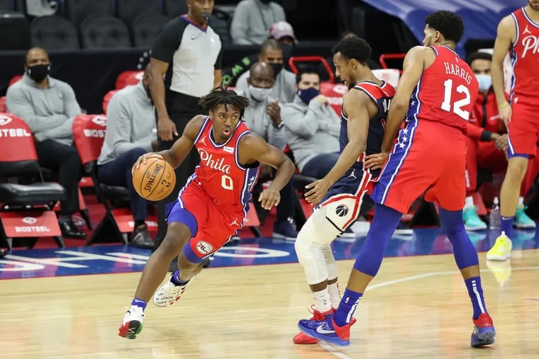 Tyrese Maxey (left) showed great potential in his first NBA game.