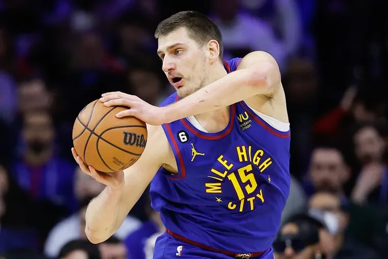 Denver Nuggets center Nikola Jokic handling the ball during a game against the Sixers on Jan. 28.