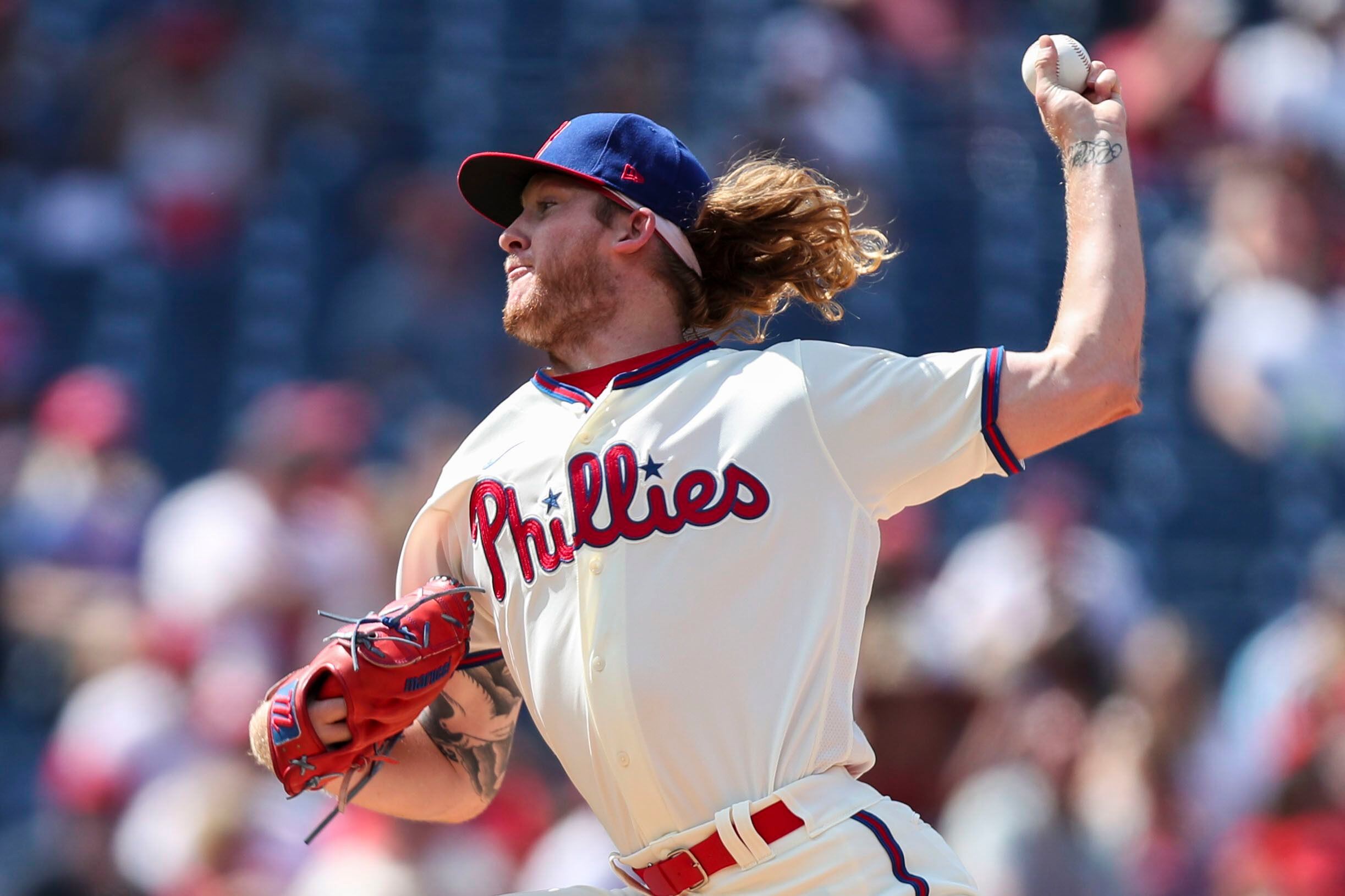 Aaron Nola tosses complete game shutout as Phillies sweep Reds