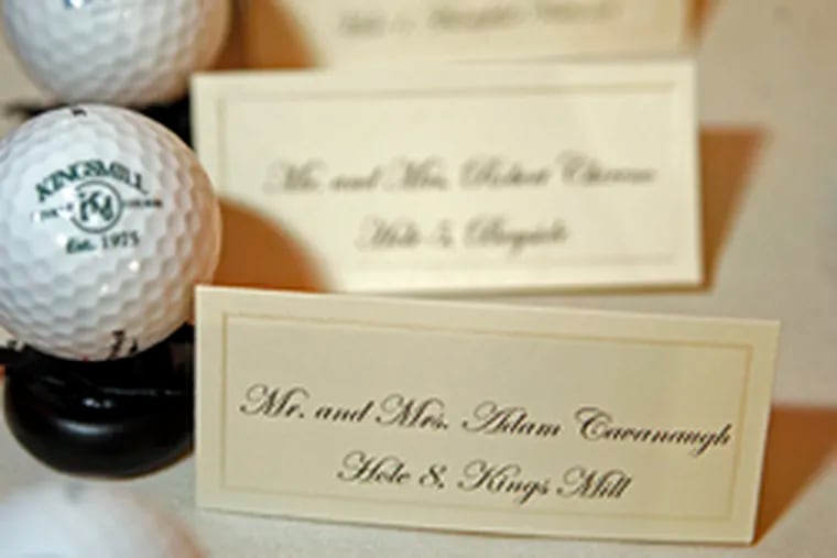 Seating cards are held by golf balls donated by 14 of the courses where the couple have played, including one in Japan. The theme was also reflected in wine-glass charms they crafted themselves.