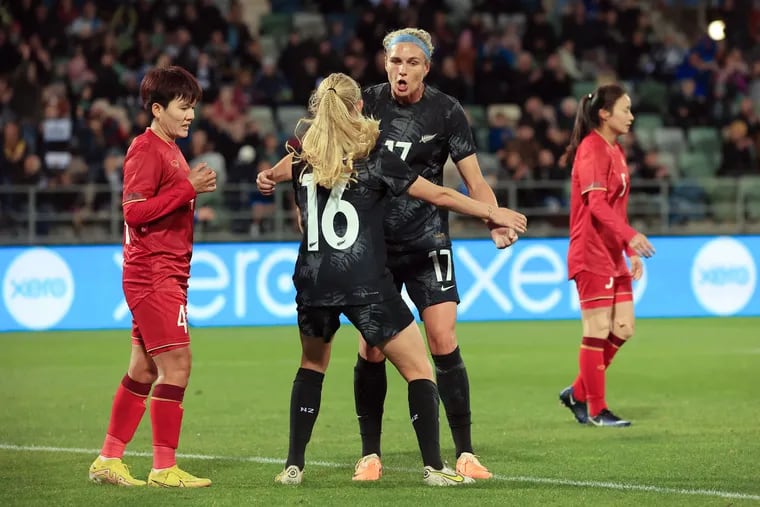 New Zealand's Hannah Wilkinson congratulates teammate Jacqui Hand on her goal during the women's international friendly football match between New Zealand and Vietnam ahead of the Women's World Cup 2023 football tournament, in Napier on July 10, 2023. (Photo by DAVE LINTOTT/AFP via Getty Images)