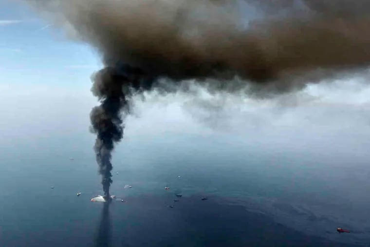 The Deepwater Horizon rig burning in April. BP's stock has risen 63 percent from its June low.