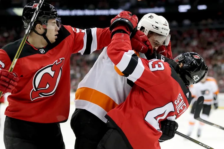 Devils Rally to Eliminate Flyers - The New York Times