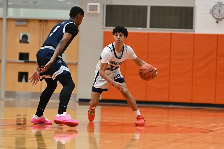 Phoenixville sophomore Dawson Brown, right, handles the ball against Pottstown in Pioneer Athletic Conference semifinal. The Panthers are a contender for the District 1-5A crown.