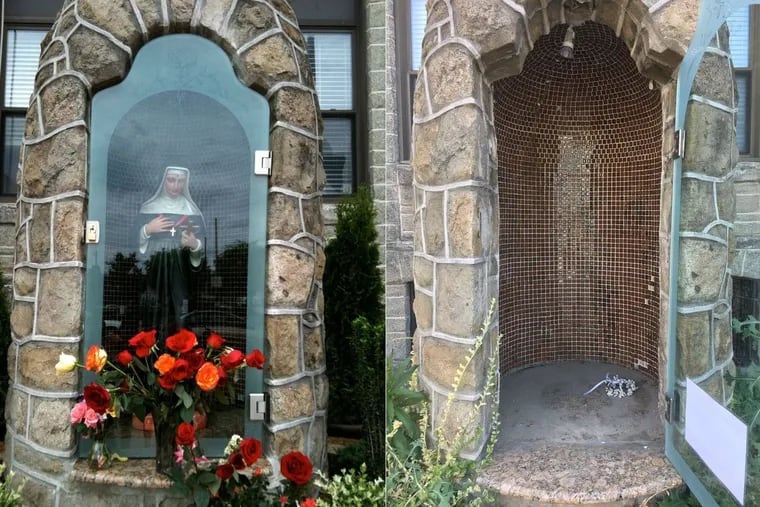 An outdoor statue secured behind a locked glass door was reported stolen Friday at the National Shrine of St. Rita of Cascia on Broad Street in South Philadelphia.