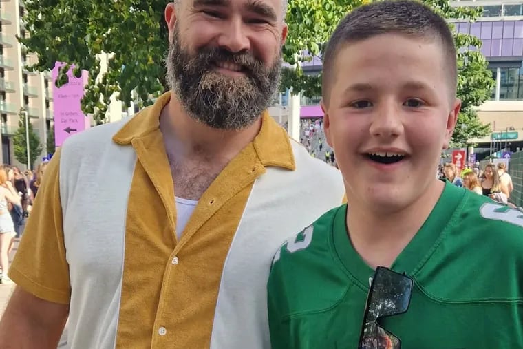Aiden Walker, 13, with Jason Kelce outside Wembley Stadium in London at the Eras Tour on June 22. Kelce surprised Aiden, who wore a kelly green Kelce jersey to the show, in a clip that quickly went viral on social media.