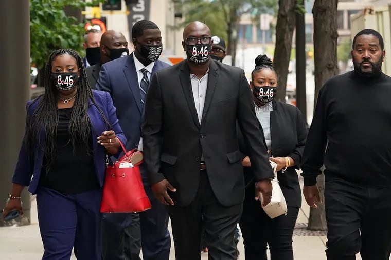 Family members of George Floyd, including his brother Philonise Floyd, are shown arriving at the Hennepin County Family Justice Center for a hearing on Sept. 11, 2020.